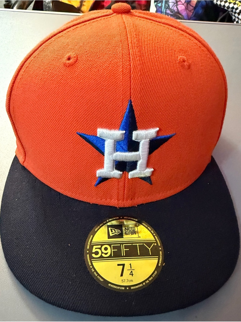 New Era Orange Crown Navy Brim Fitted Hat with White & Blue Logo